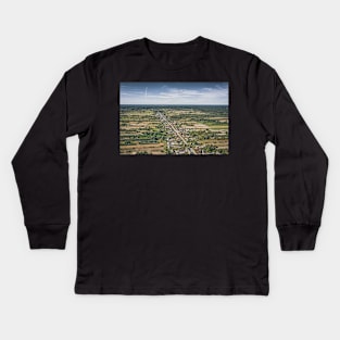 Aerial view of village surrounded by agricultural fields Kids Long Sleeve T-Shirt